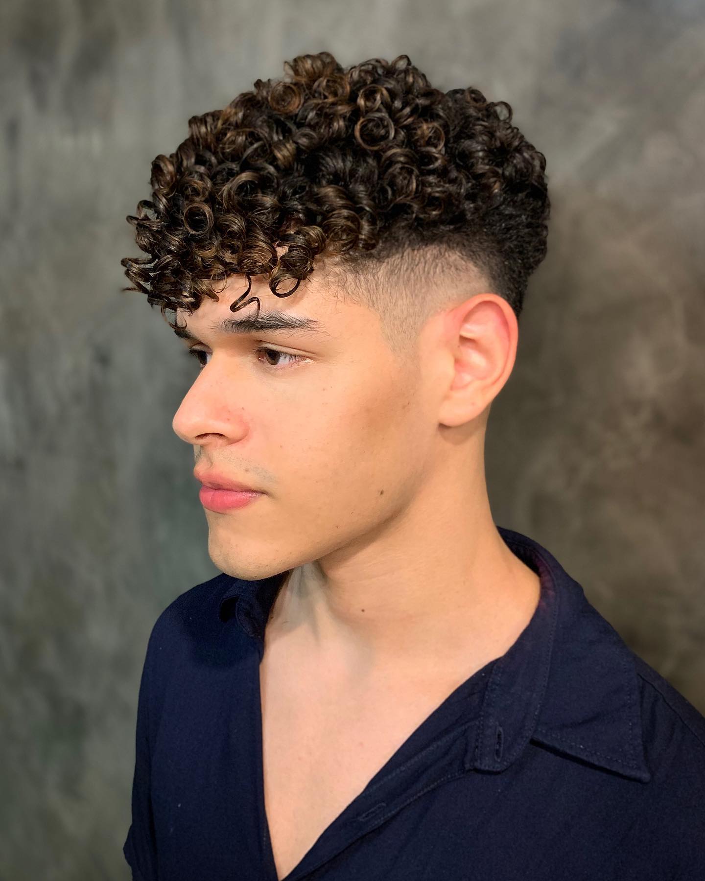Textured Curls With Mid Fade And Fringe