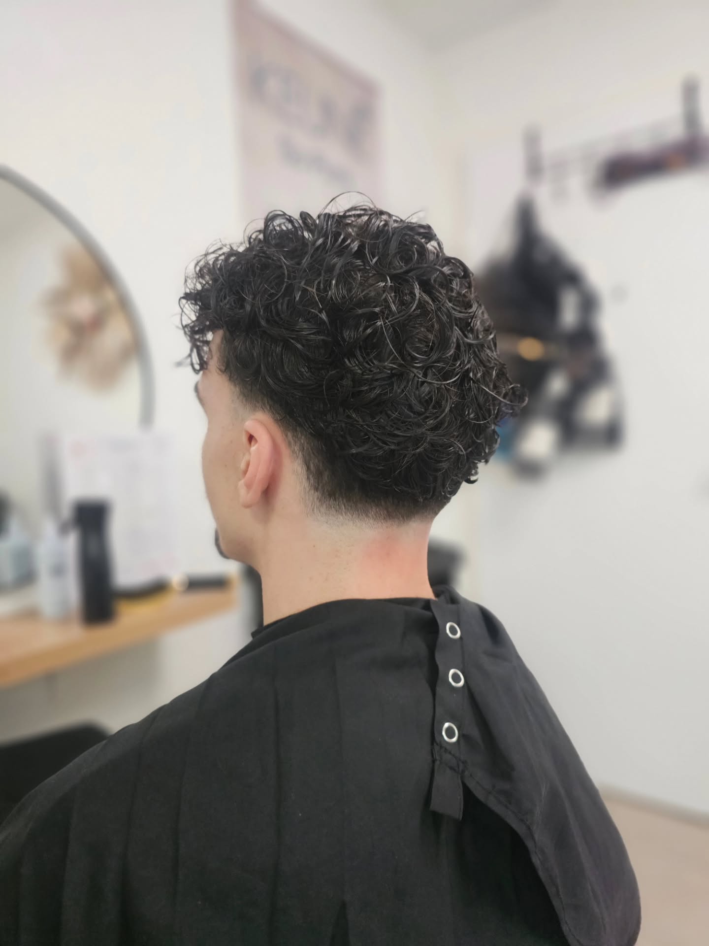 Textured Curly Crop With A Taper Fade