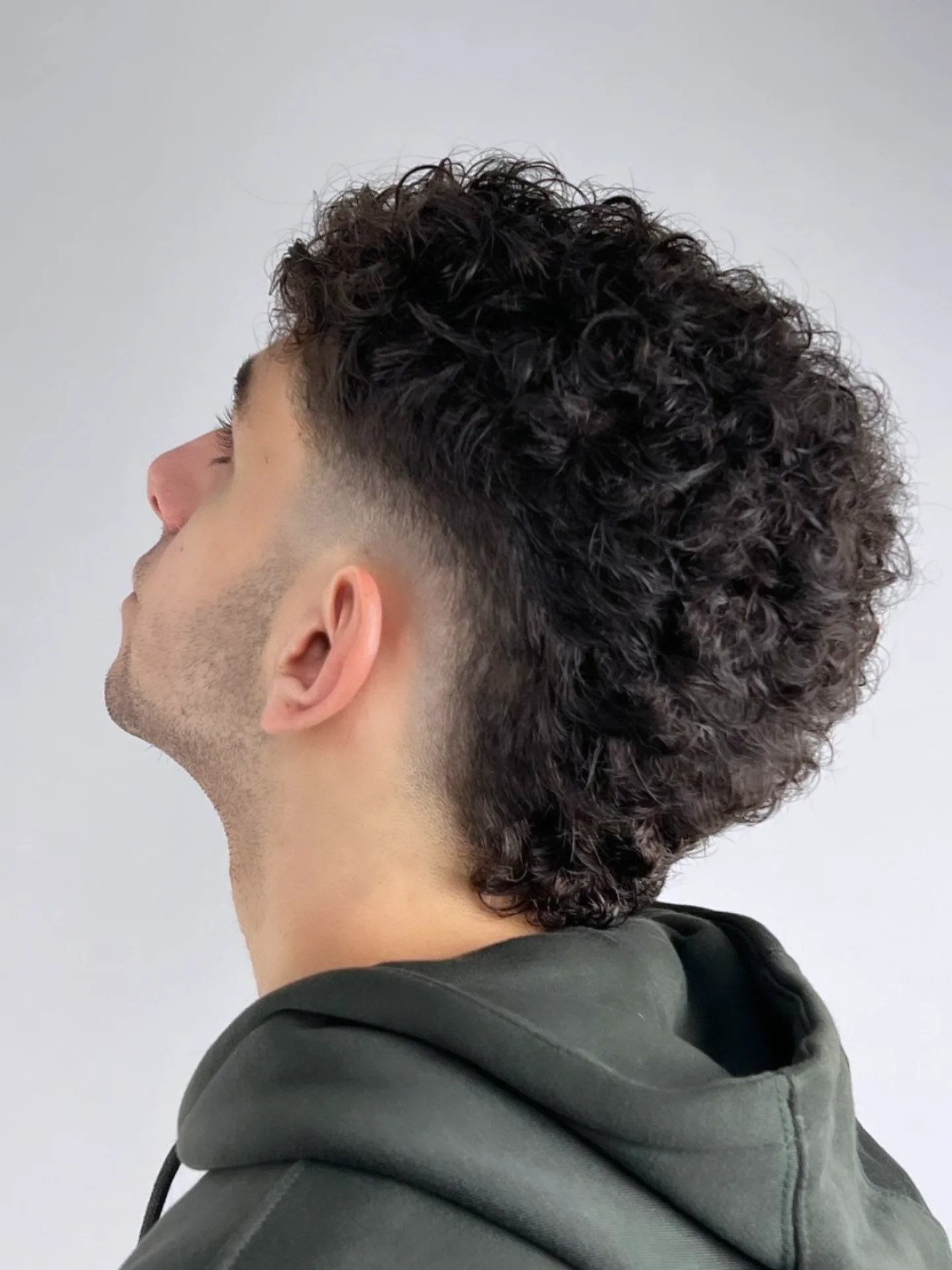 Textured Curly Mullet With Taper Fade