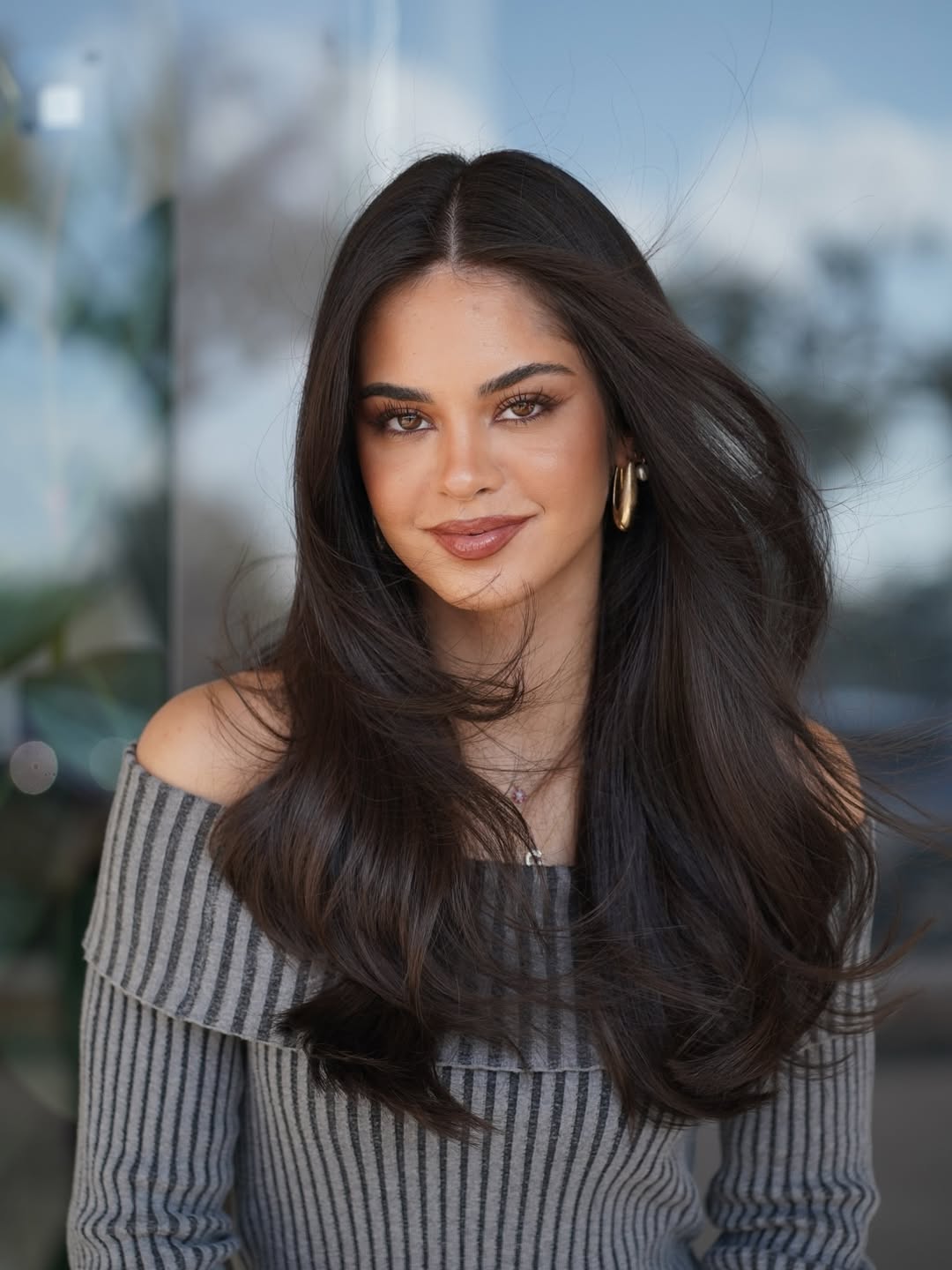 Voluminous Mocha Brown Waves With Face-Framing Layers
