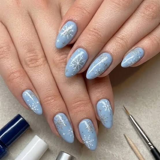Medium Oval Light Blue Nails With Snowflakes — Winter Christmas Nails