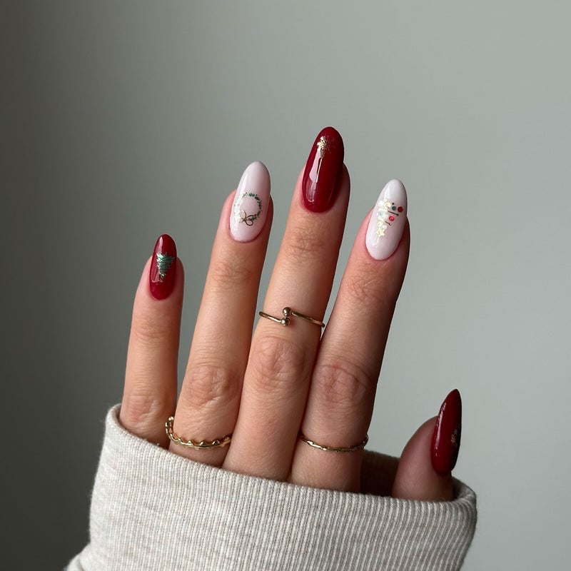 Medium Oval Nails With Gold Christmas Motifs — Winter Christmas Nails