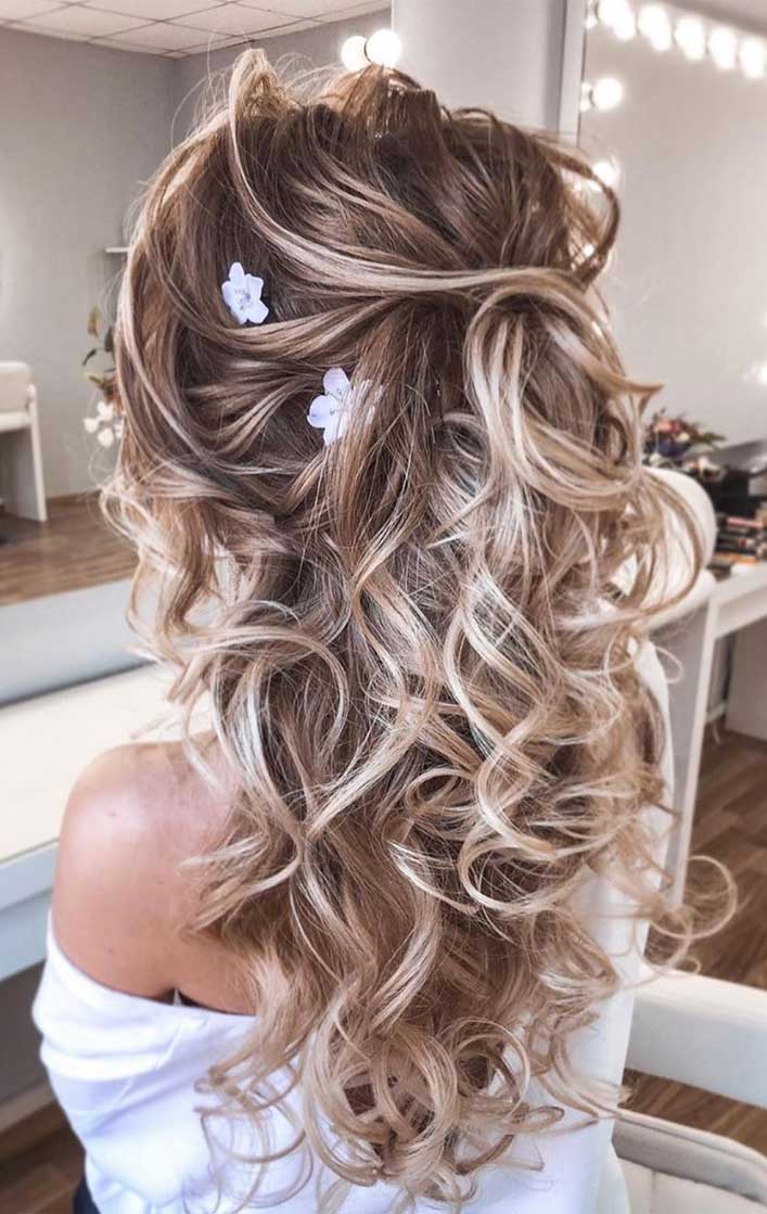 Half-Up With Loose Curls and Floral Accents — Winter Formal Hairstyles