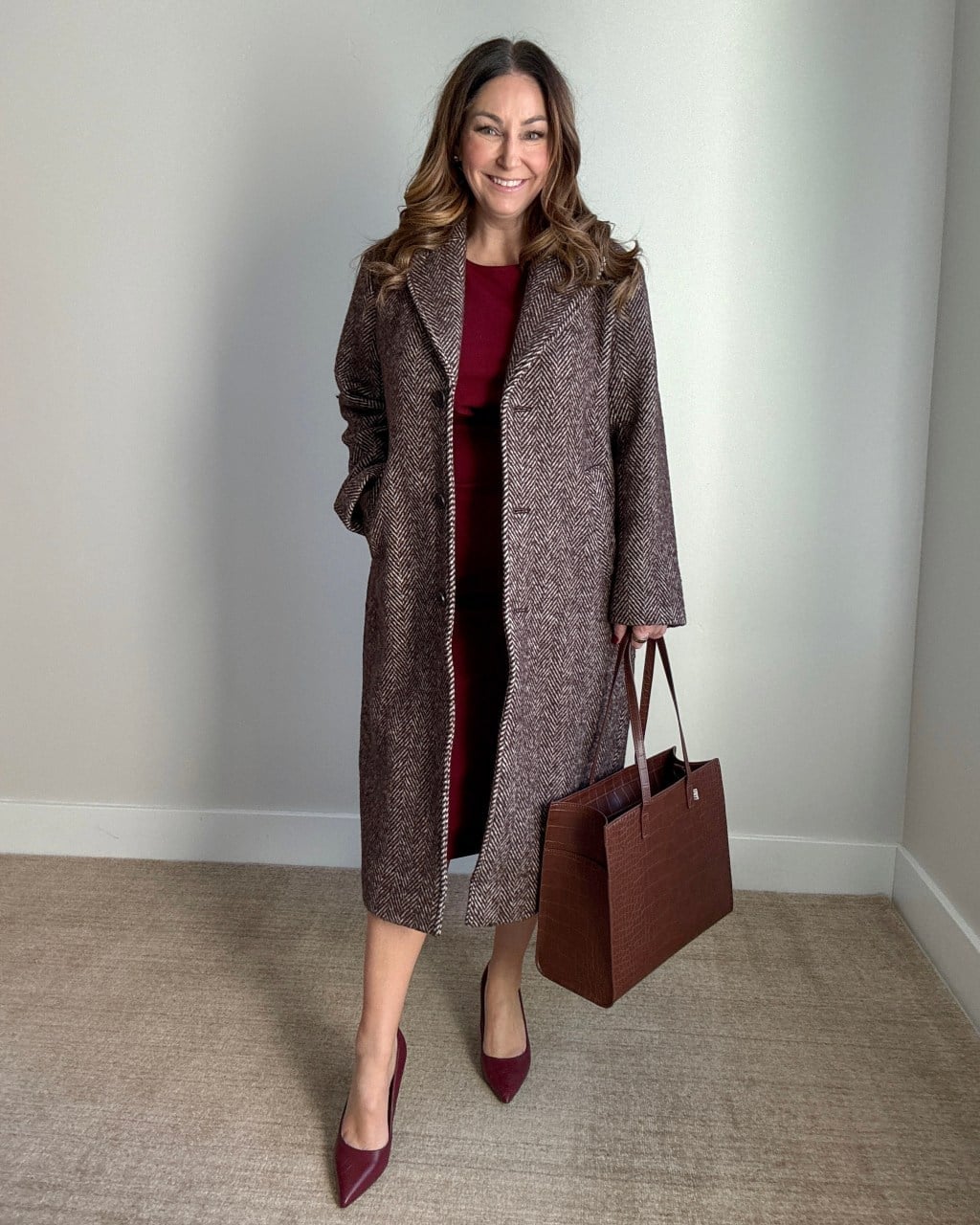 Herringbone Wool Coat Over a Burgundy Dress — Winter Work Outfits
