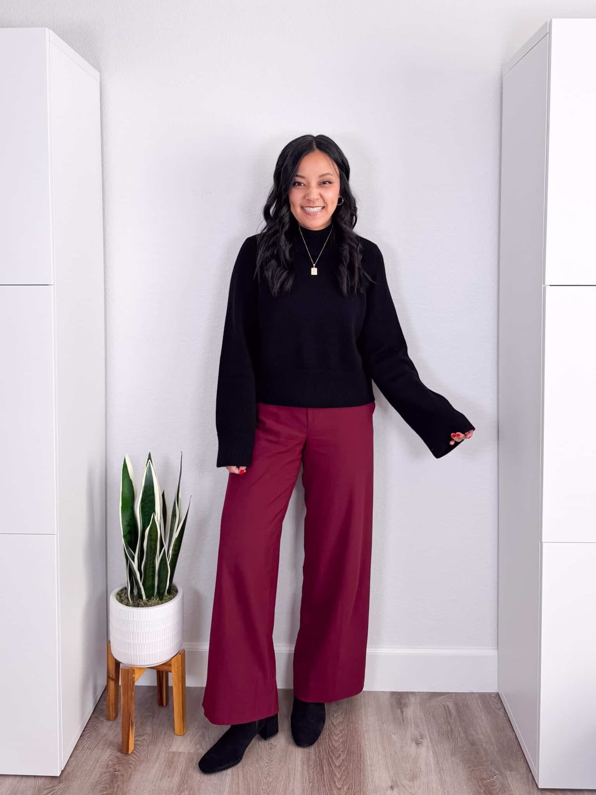 Black Turtleneck with Burgundy Wide-Leg Trousers, Close-Up Take — Winter Work Outfits