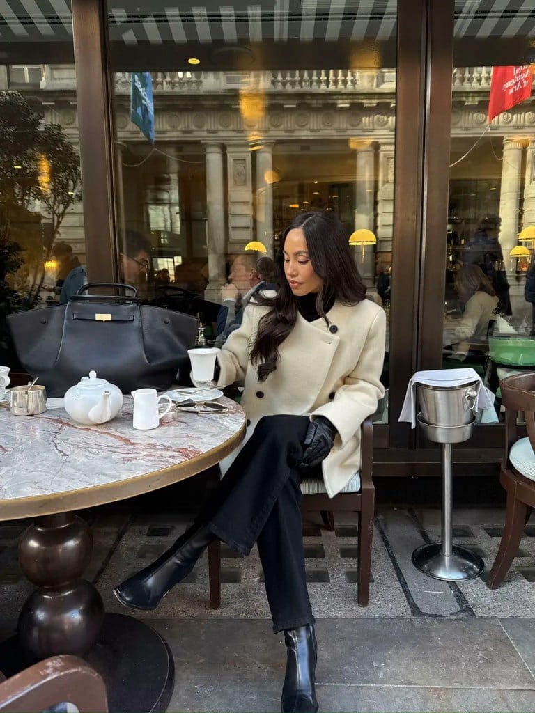 Cream Double-Breasted Coat Over Black Turtleneck and Trousers — Winter Work Outfits