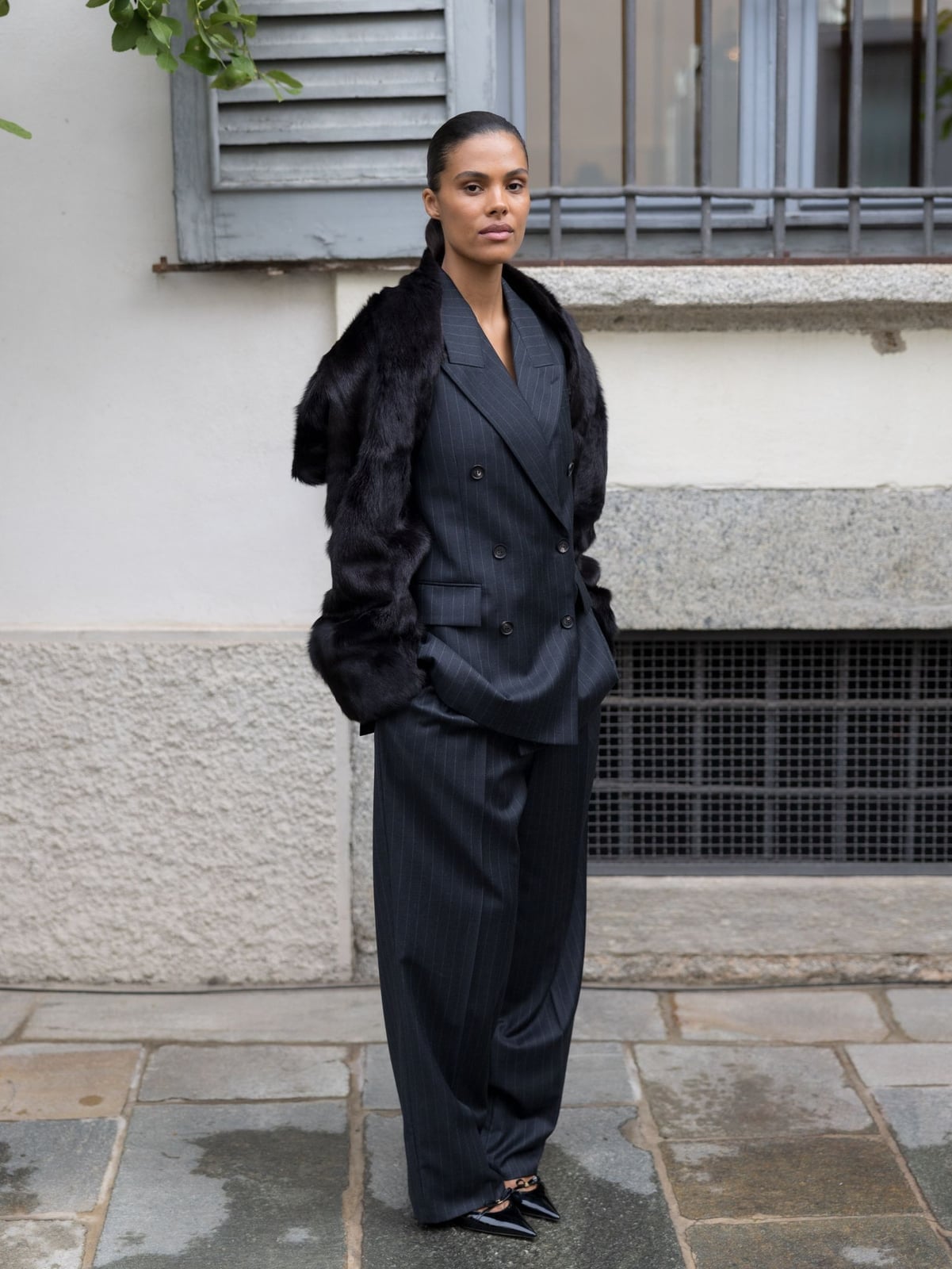 Pinstripe Oversized Suit with a Dramatic Fur Stole — Winter Work Outfits